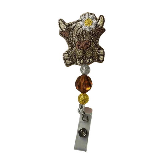 Highland Cow with Daisy Badge Reel