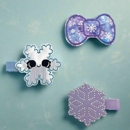 Purple and blue snowflake hair clip set