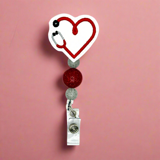 Retractable badge holder with stethoscope design on a white background