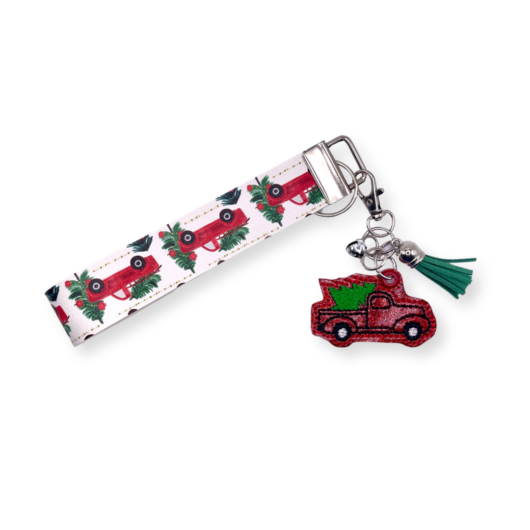 Red truck with Christmas tree keychain and wristlet