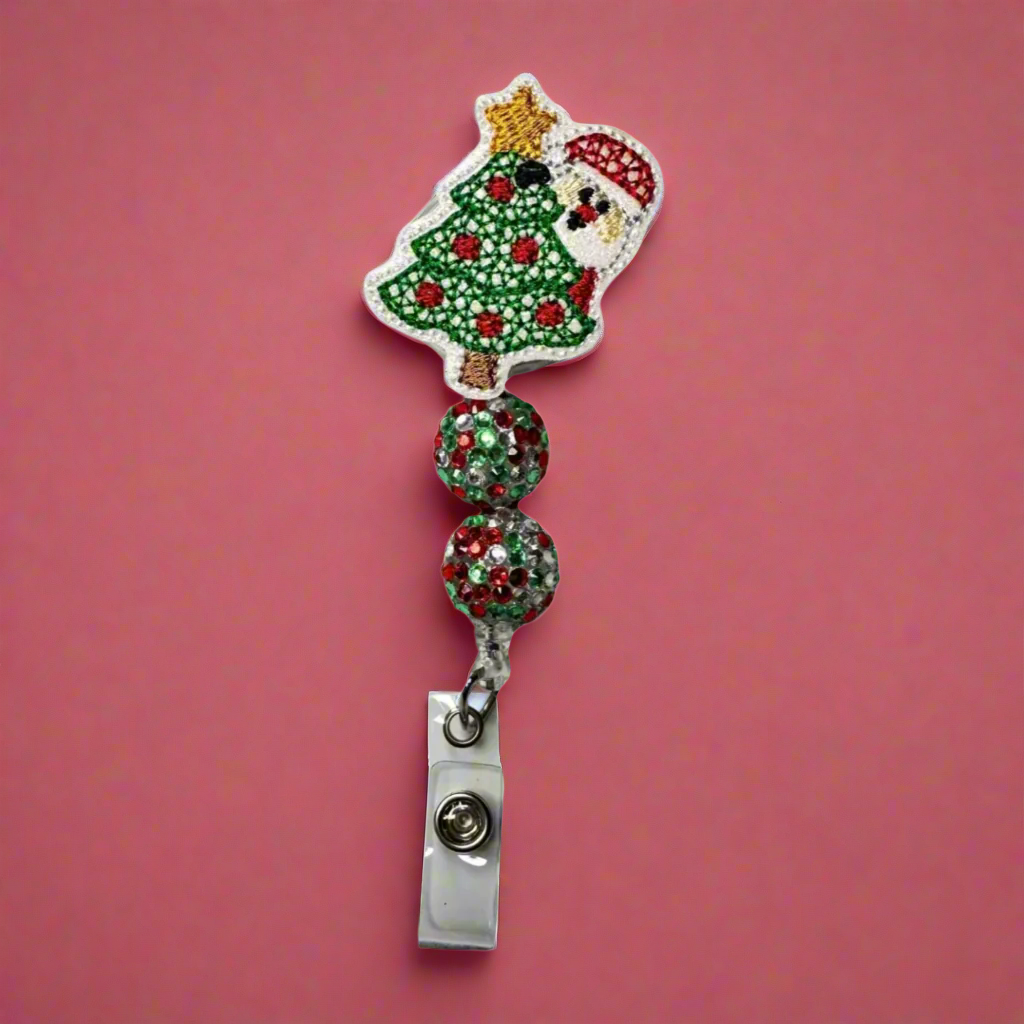 Santa behind Tree Badge Reel