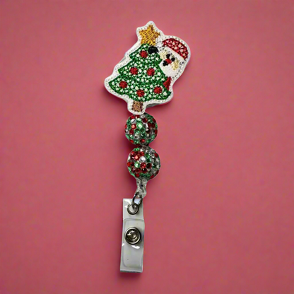 Santa behind Tree Badge Reel