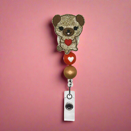 Dog holding Heart Beaded Badge Reel