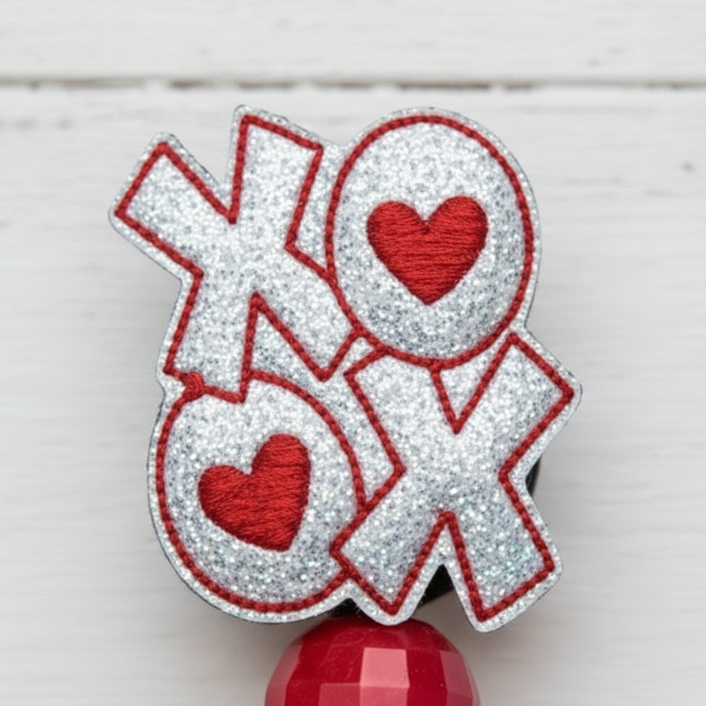 Silver XOXO Badge Reel