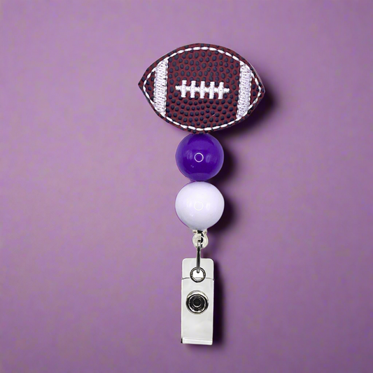 Purple and White Football Badge Reel