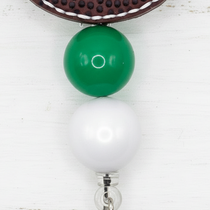 Green and White Football Badge Reel