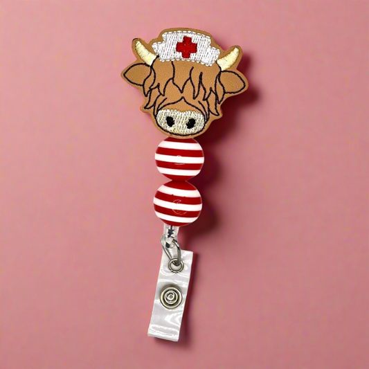 Highland cow nurse badge reel