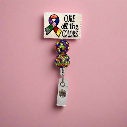 Cure All The Colors Ribbon Badge Reel