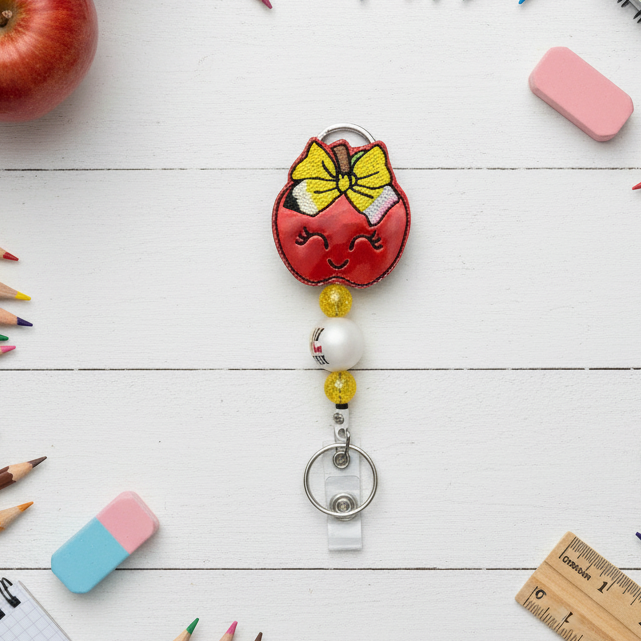 Apple with Bow Badge Reel