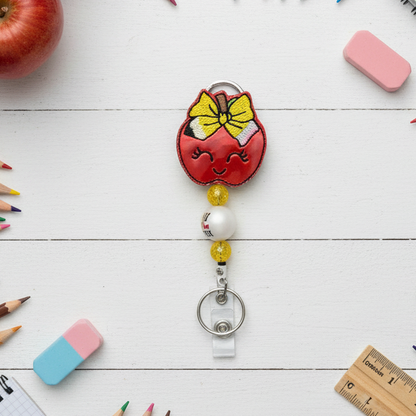 Apple with Bow Badge Reel