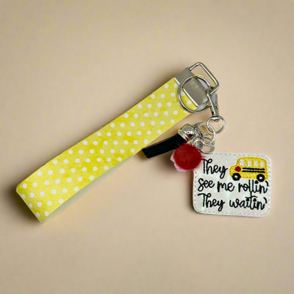 They see me Rollin Keychain and Wristlet