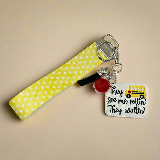 They see me Rollin Keychain and Wristlet