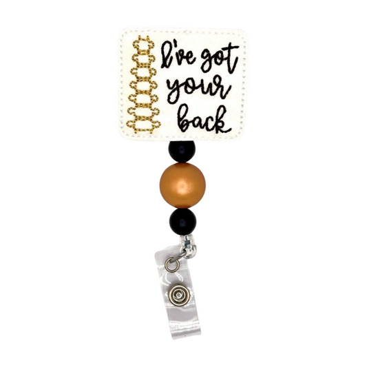Retractable badge holder with beads and 'I've got your back' text on a white background