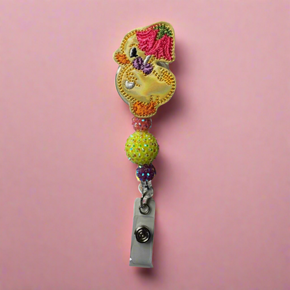 Duck with Flower Umbrella Badge Reel