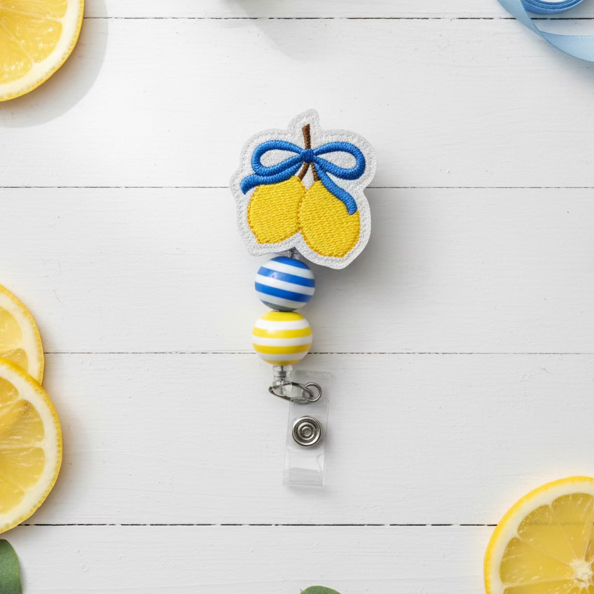 Lemons with Bow Badge Reel