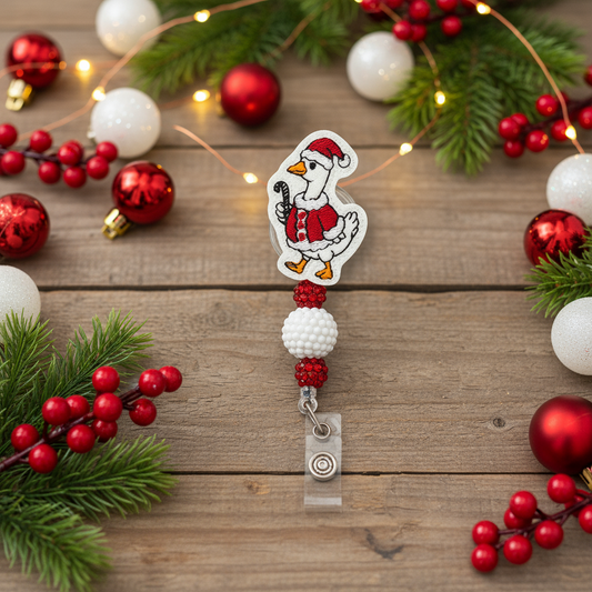 Christmas-themed badge holder with decorative elements on a wooden surface