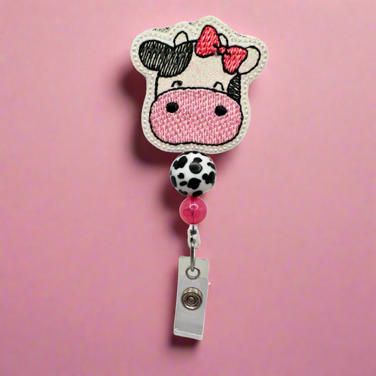 Cow with Bow Badge Reel