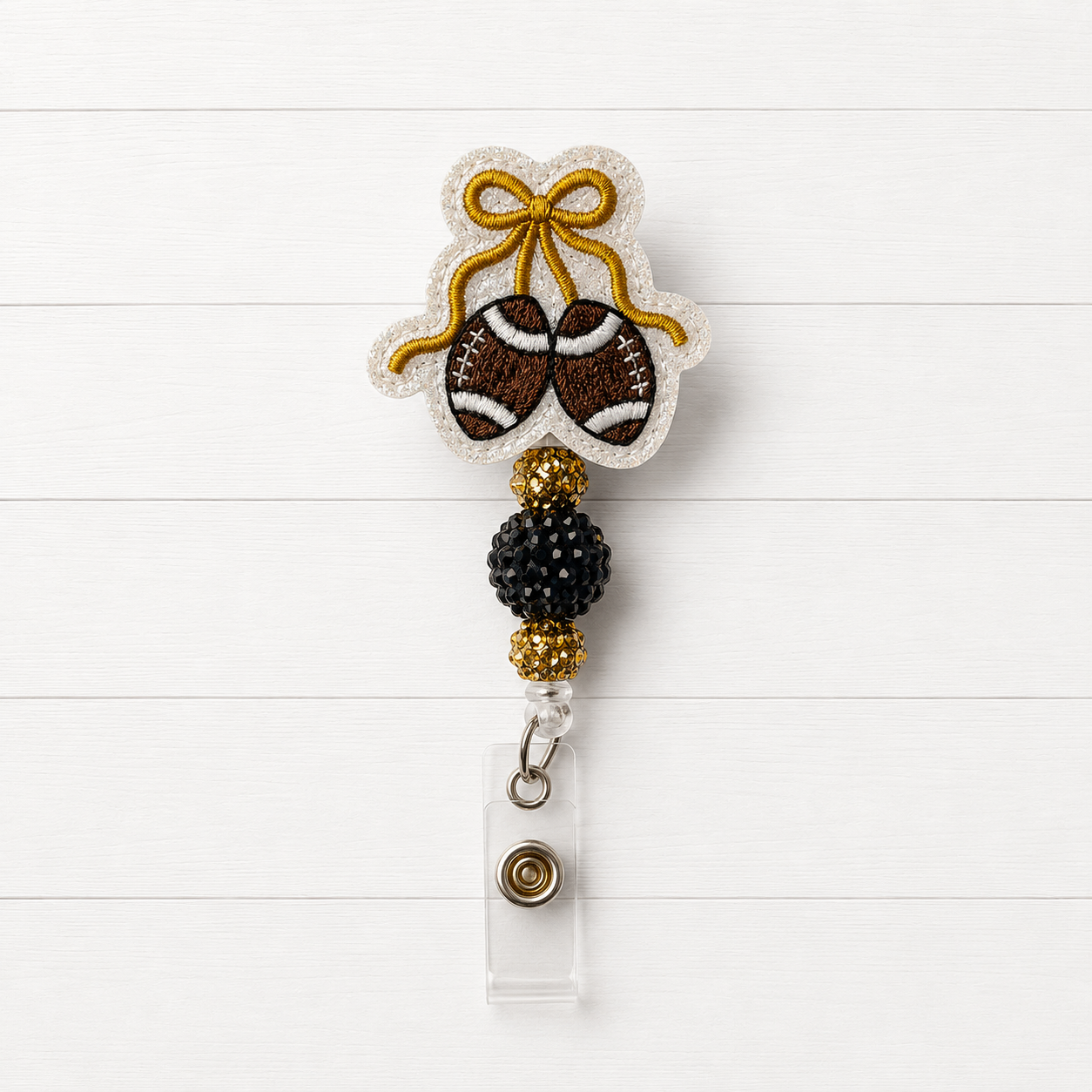 Gold Bow Football Badge Reel