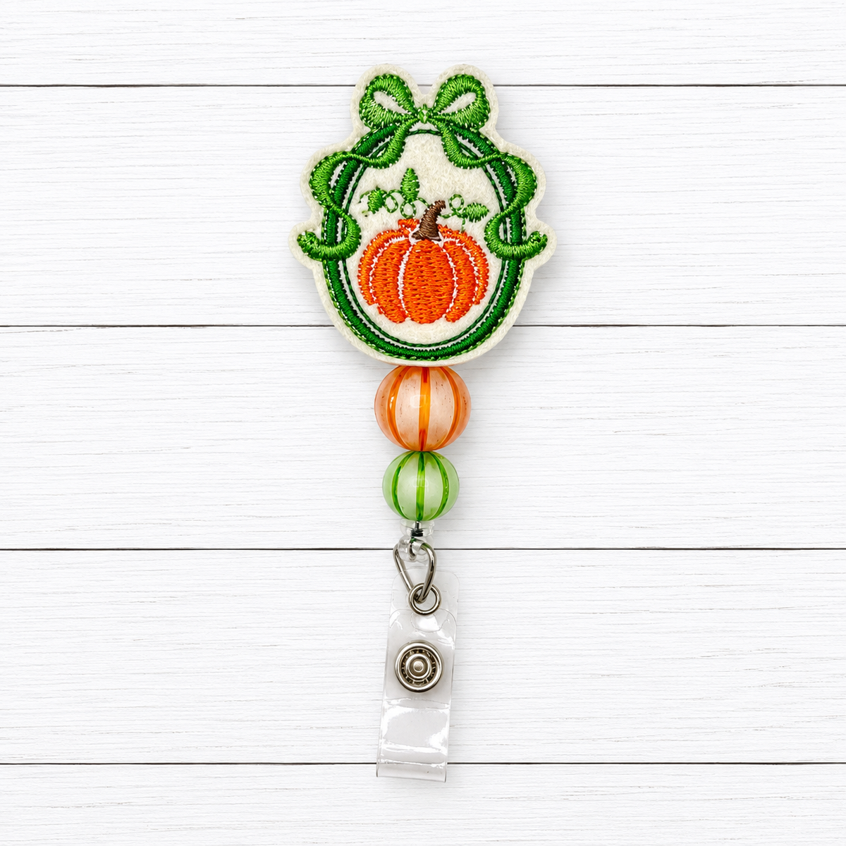 Framed Bow Pumpkin Badge Reel