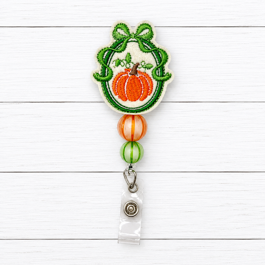 Framed Bow Pumpkin Badge Reel