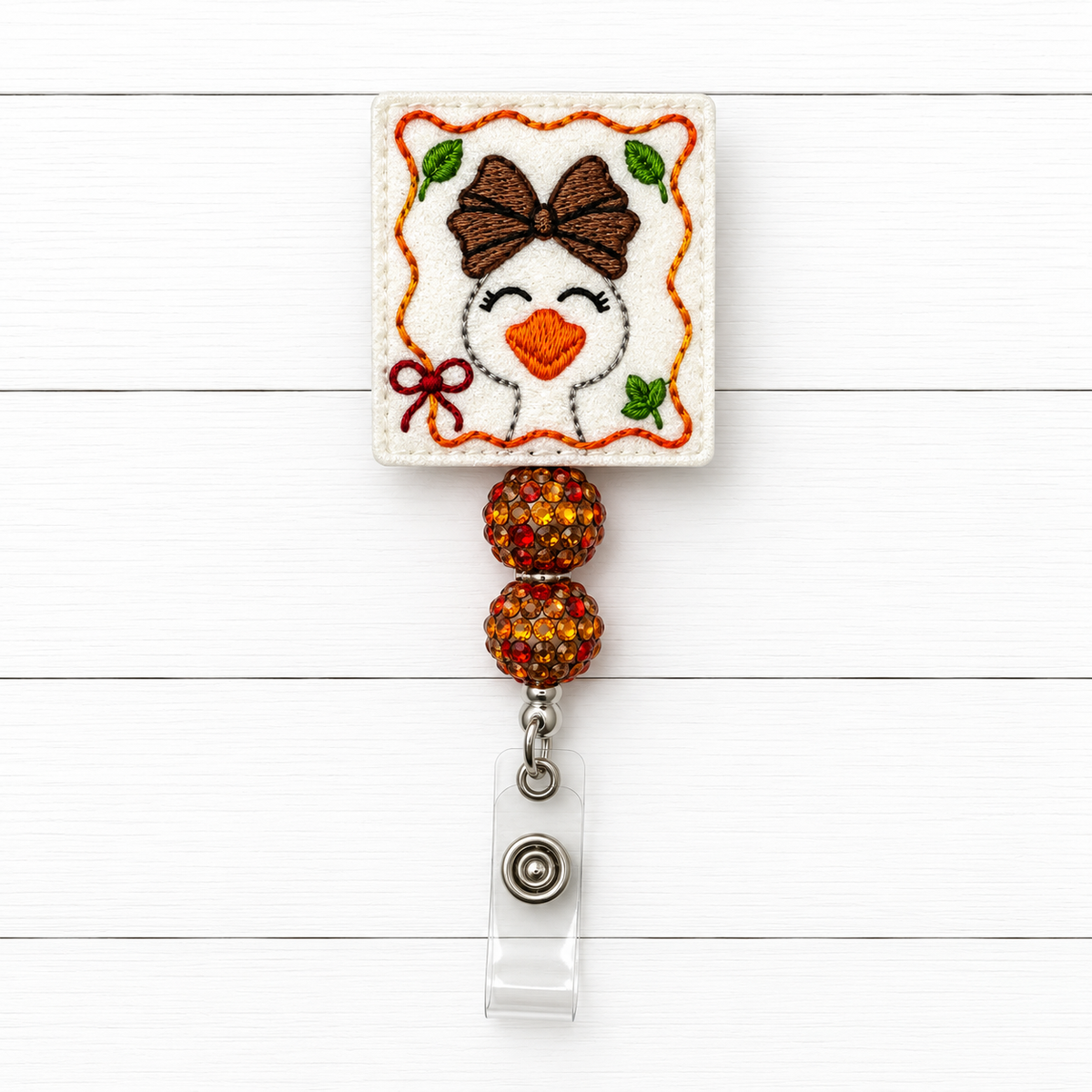 Fall Goose with Bow Badge Reel
