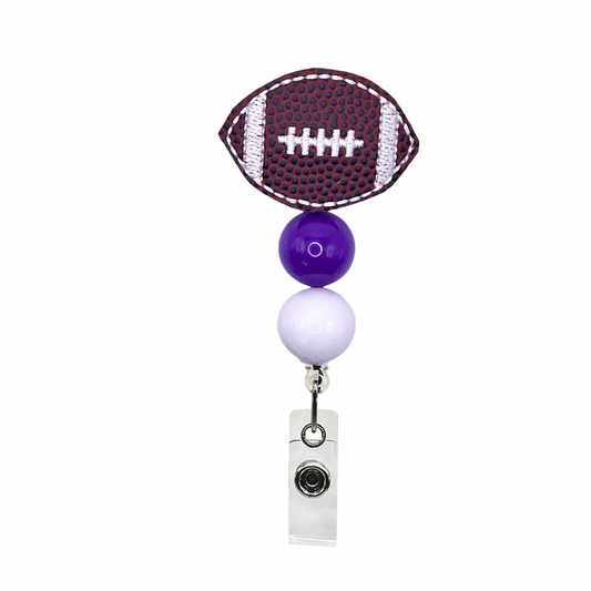 Purple and White Football Badge Reel