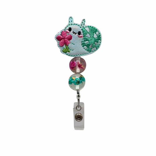 Snail with Flower Badge Reel
