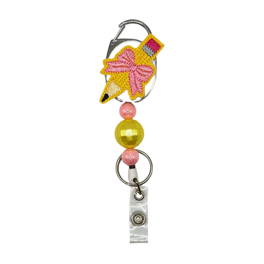 Pencil with Bow Badge Reel