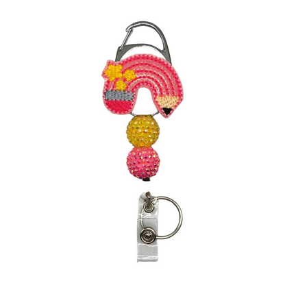 Keychain with flamingo design on a white background