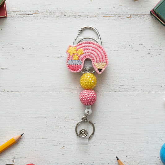 Pink Pencil Rainbow Badge Reel