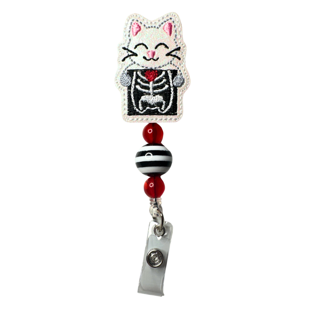 Cat X-Ray Badge Reel