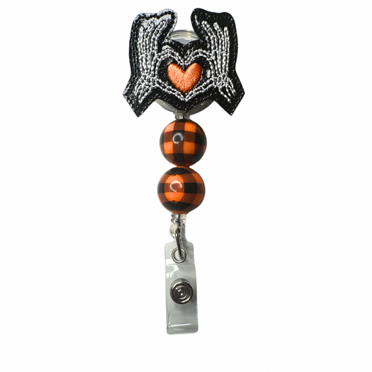 Skeleton Hand Heart Badge Reel