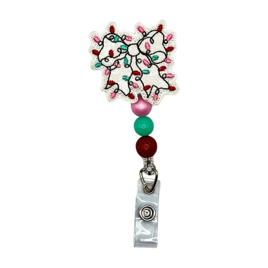 Christmas Light Bow Badge Reel