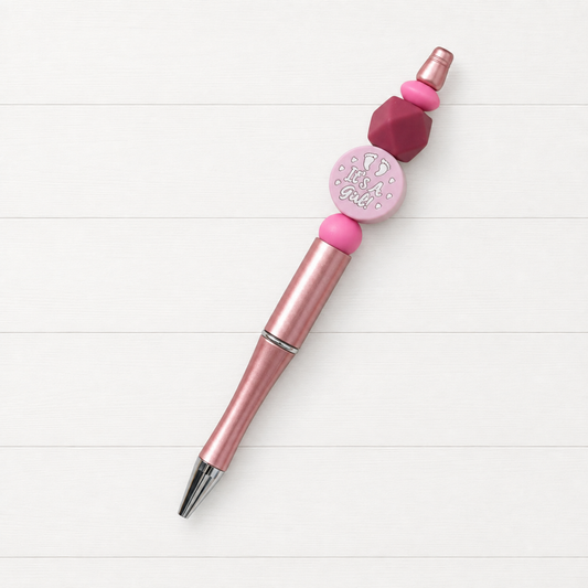 Birth Announcement Beaded Pen on a clean white wood background