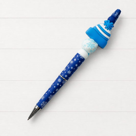 Blue Snow Hat Beaded Pen on a clean white wood background
