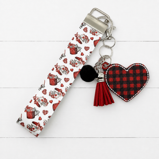Buffalo Plaid Heart Keychain and Wristlet on clean white painted wood background
