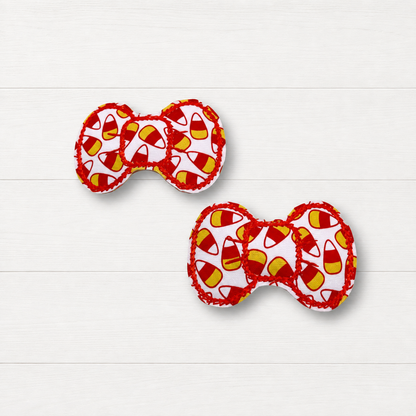 Candy Corn Hair Clips on a clean white wood background