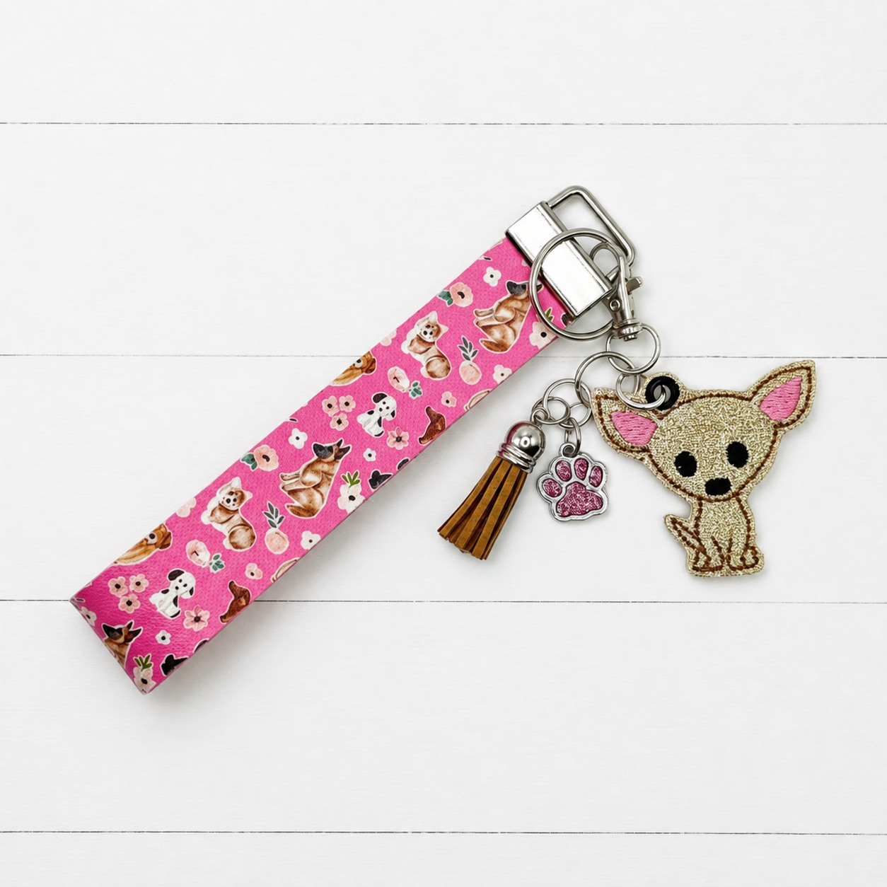 Chihuahua Keychain and Wristet on clean white painted wood background