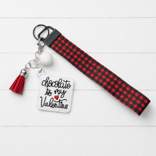 Chocolate is My Valentine Keychain and Wristlet on clean white painted wood background