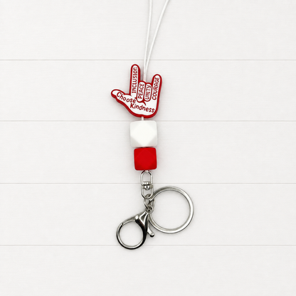 Choose Kindness Lanyard on a clean white wood background