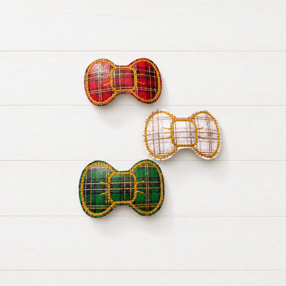 Green, Red, and White Plaid Hair Bow Clip Set on a clean white wood background