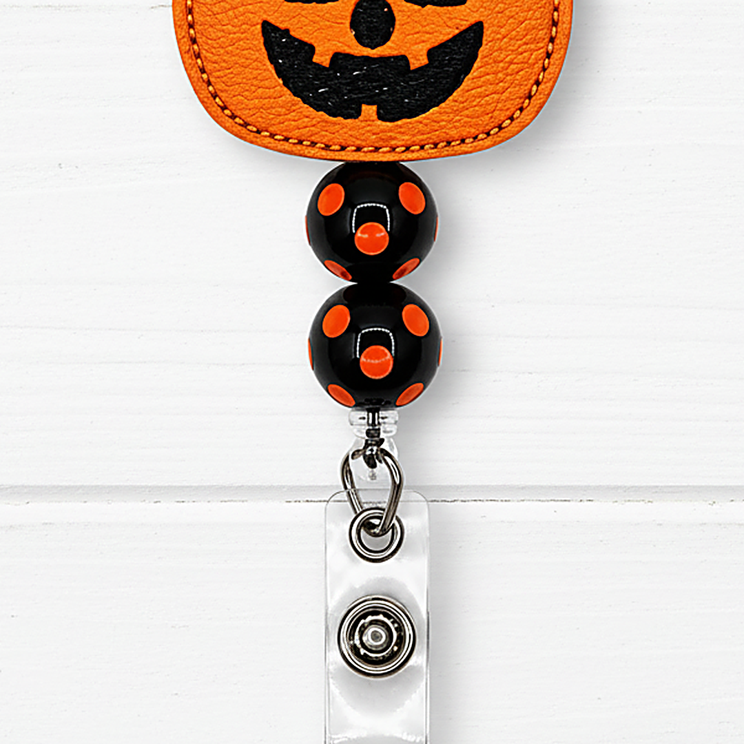 Cute Pumpkin with Bow Halloween Badge Reel