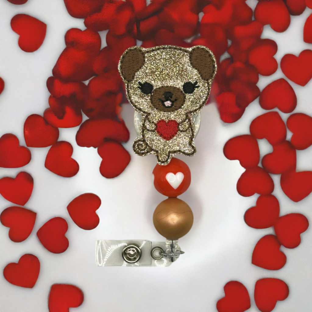 Dog holding Heart Beaded Badge Reel