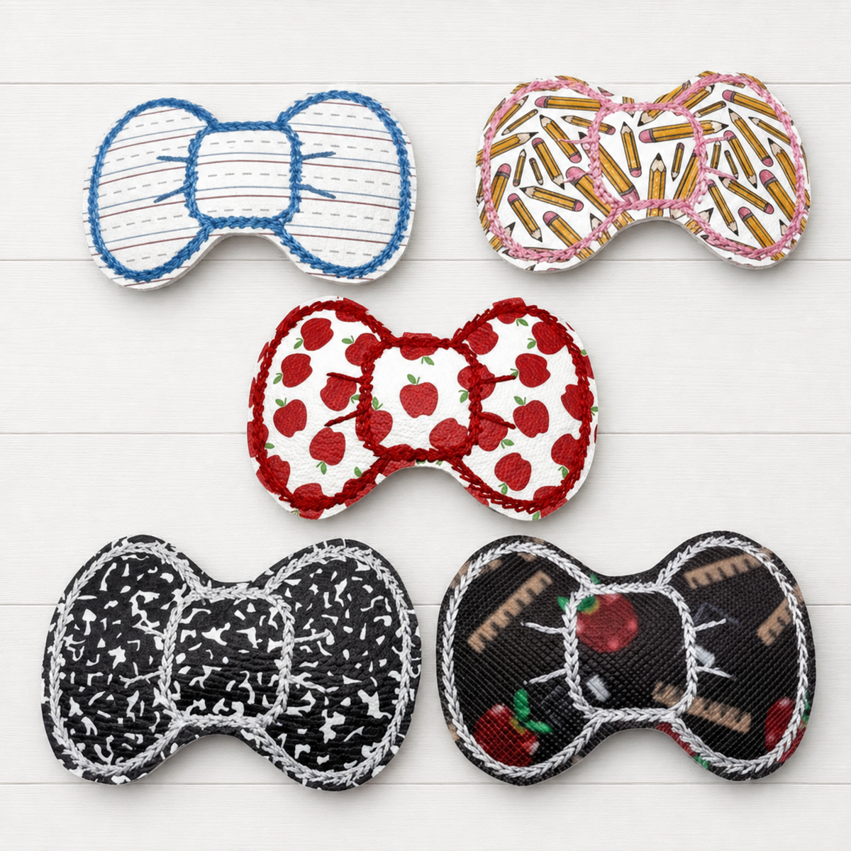 Back to School Hair Bow Clips on a clean white wood background