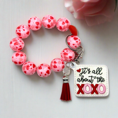 All About the XOXO Keychain and Beaded Wristlet