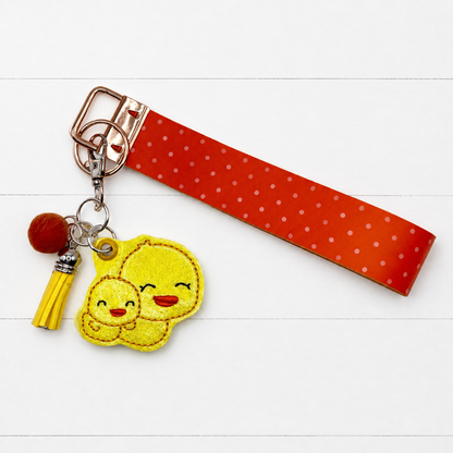 Ducks Keychain and Wristlet — clean white wood primary image