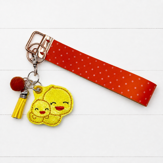 Ducks Keychain and Wristlet — clean white wood primary image