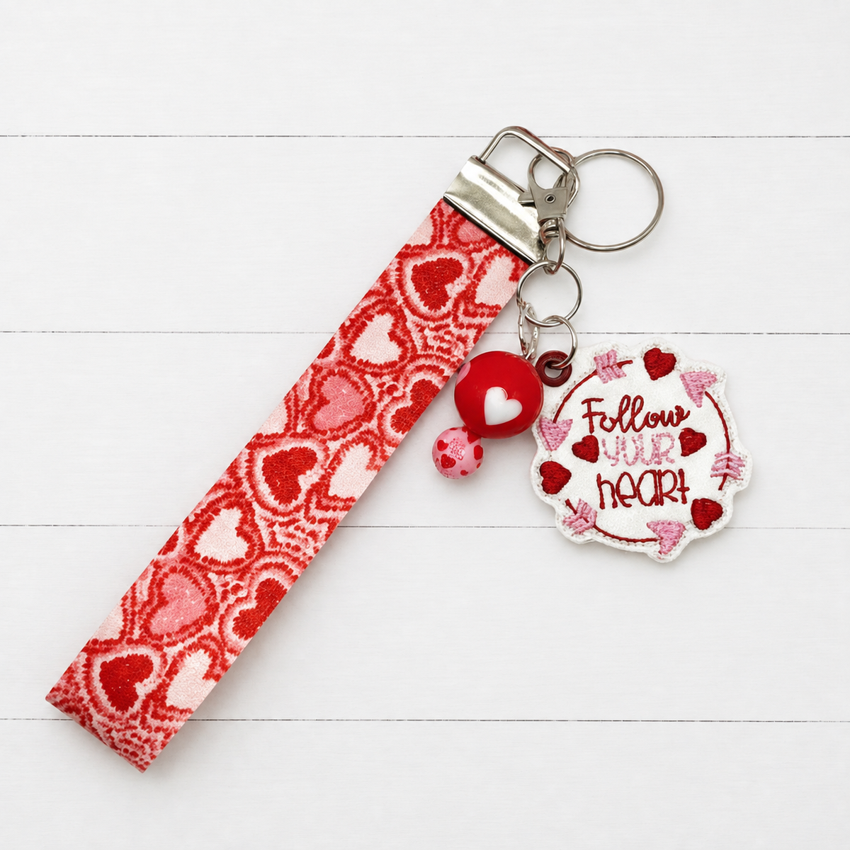 Follow Your Heart Heart Keychain and Wristlet — clean white wood primary image