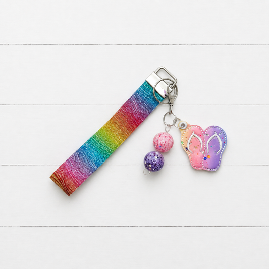 Glitter Flip Flops Keychain and Wristlet — clean white wood primary image
