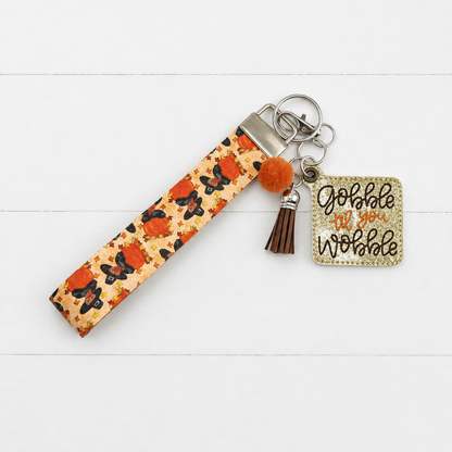 Gobble Till You Wobble Keychain and Wristlet — clean white wood primary image